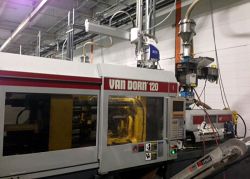 Photo of a 120 ton Van Dorn plastic injection molder from 1997