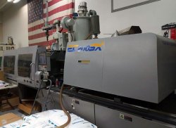 A used 198 ton Toshiba all-electric plastic injection molder for sale from 2011.
