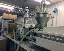 Photo of a Toshiba plastic molder from 1994