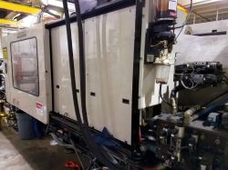 725 ton Milacron plastic molder from 1998