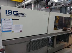 Photo of a used 250 ton Toshiba plastic injection molding machine from 1999
