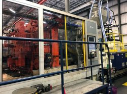 1999 Used 880 ton Krauss Maffei plastic molder with corepull installed