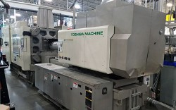 Photo of one of the used 500 ton Toshiba electric injection molders for sale