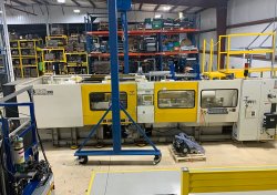 A full view of this 390 ton Toshiba used plastic injection molder from 2000