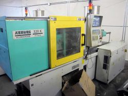 used 77 ton Arbrug plastic molder